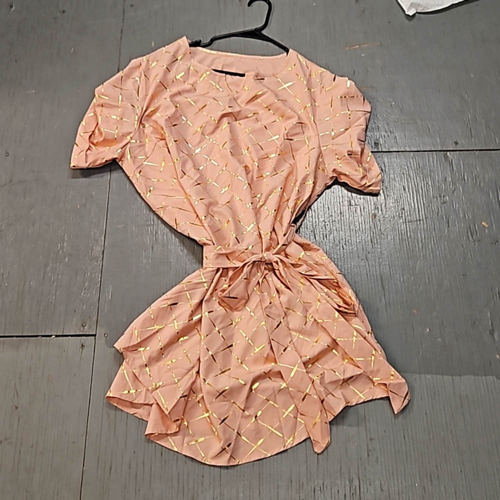 Very thin dress. Peach with gold diamond/square pattern.